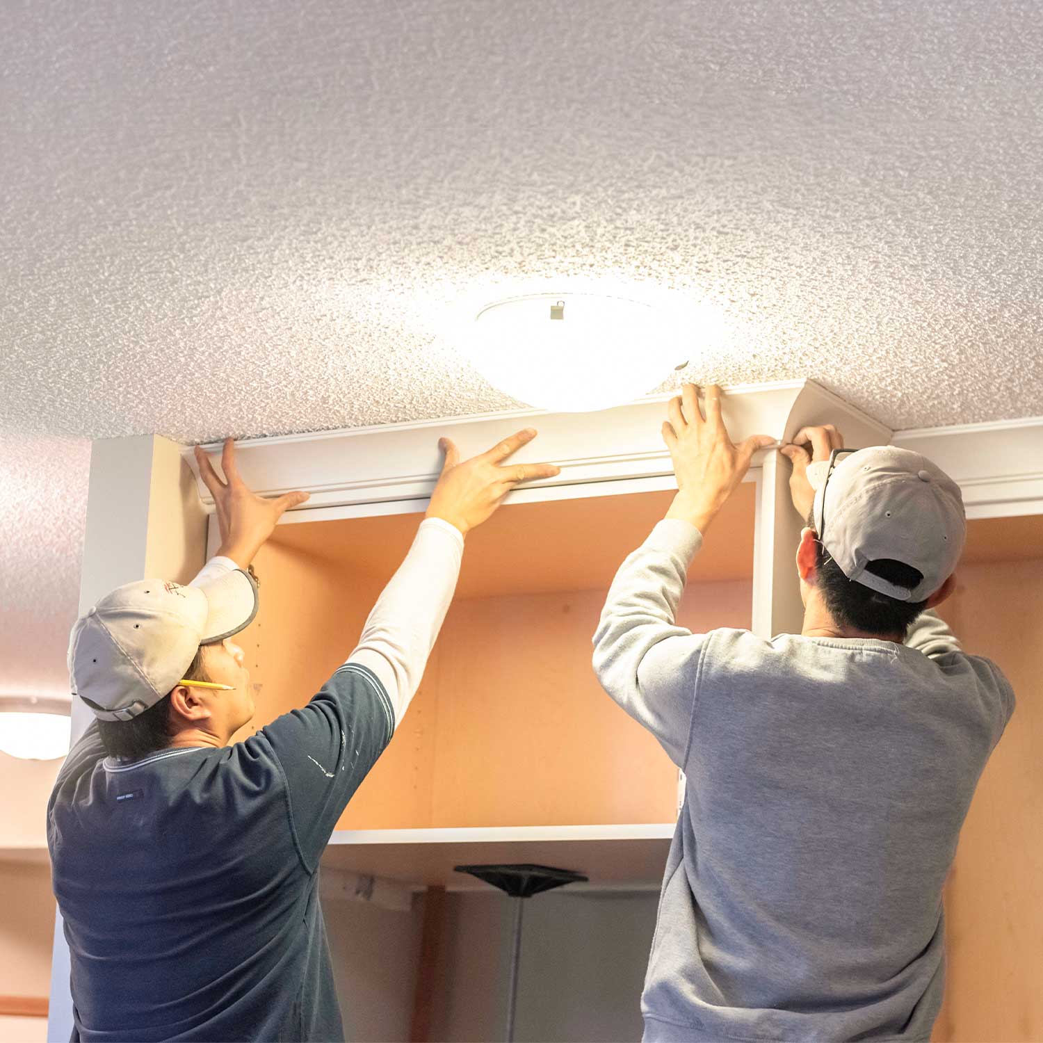 Calgary kitchen renovation process showcasing cabinet and countertop design steps.