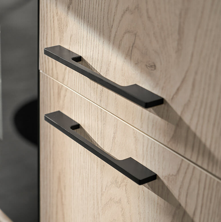 Handles 1 Stylish cabinet handles showcased for Calgary kitchen renovation by Zen Living.