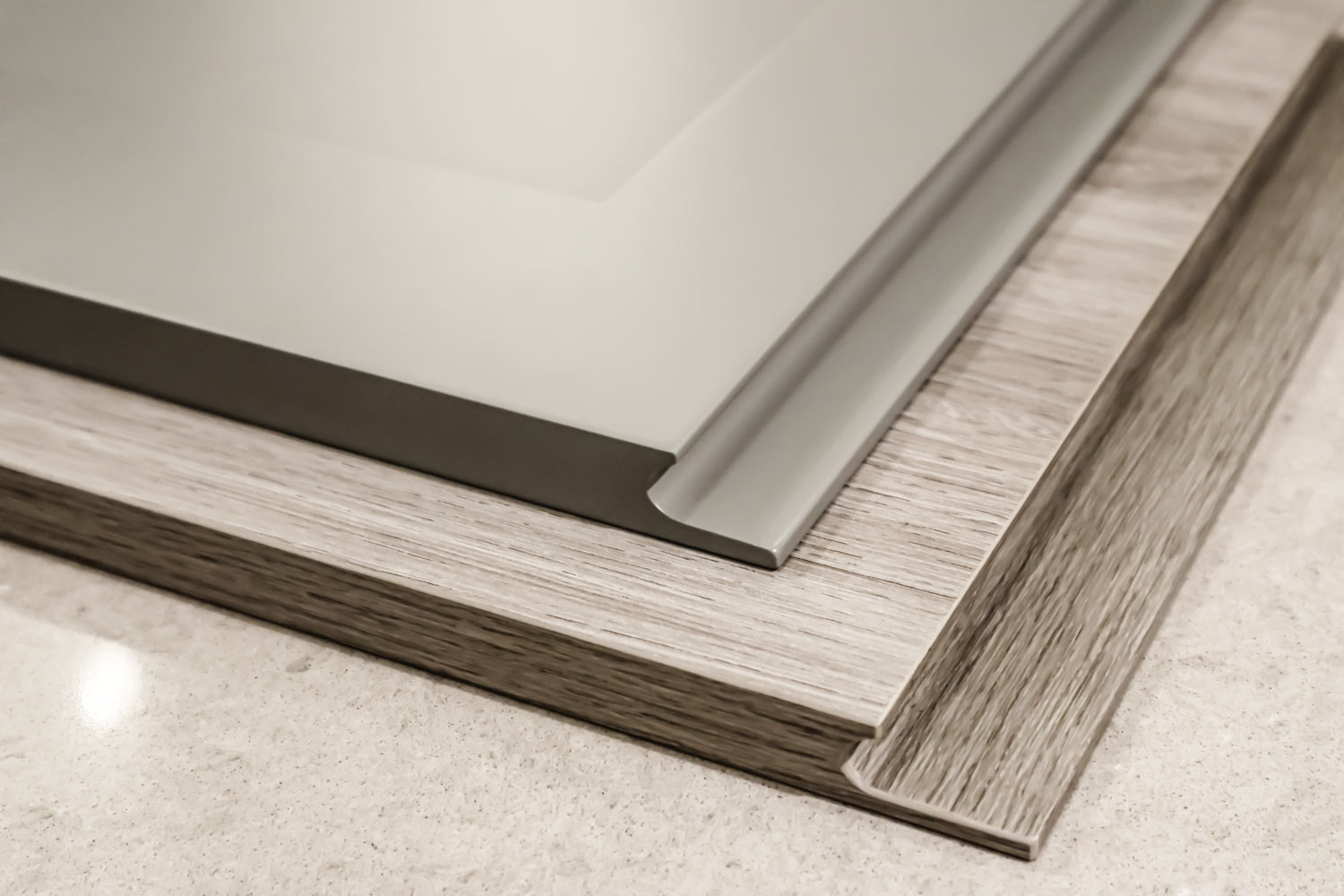 J-Groove doors for handleless kitchen cabinets, showcasing modern design in Calgary home renovations.