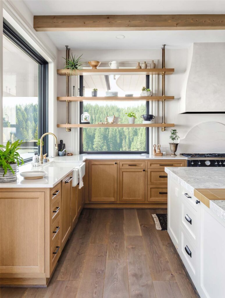 Bright kitchen with wooden shelves.